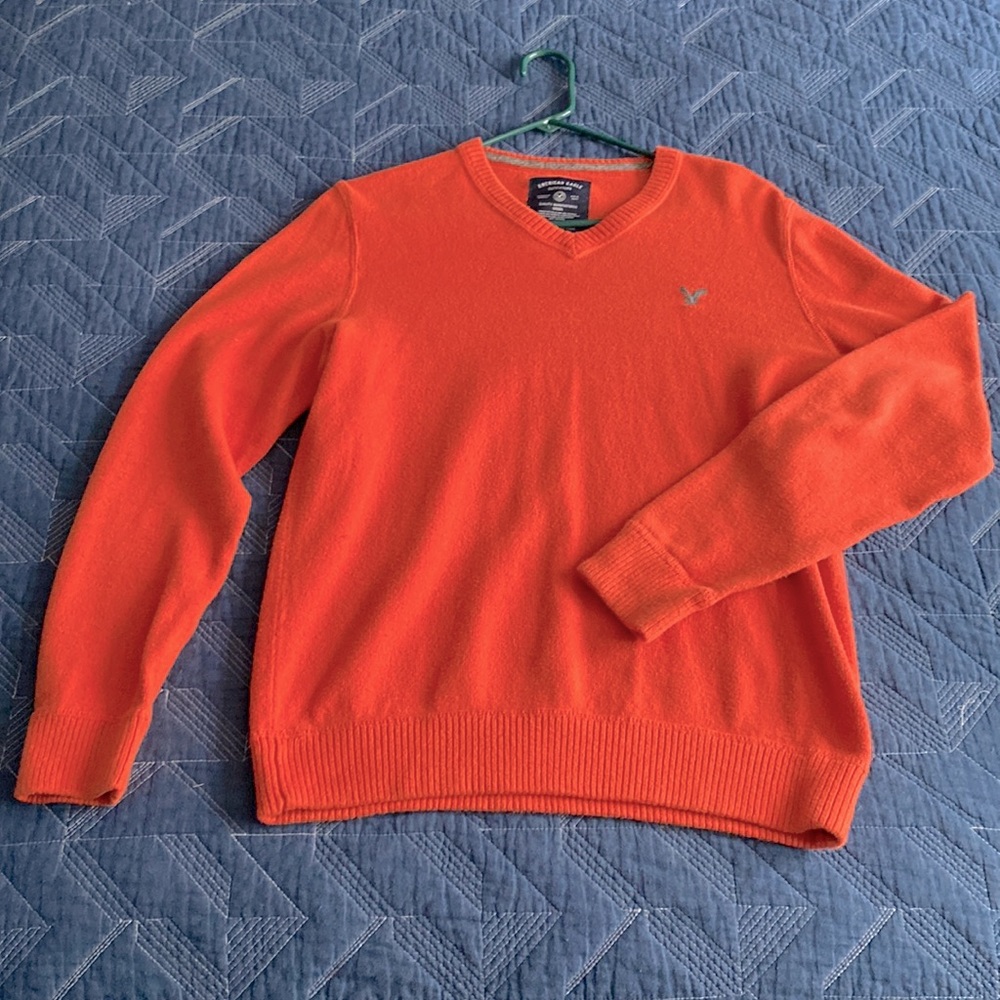 Orange American eagle sweater (size M.)